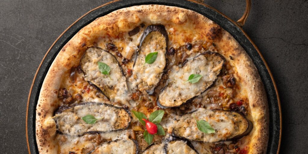 Onde comer no Dia da Pizza em Curitiba - Carmela. Foto: reprodução redes sociais.